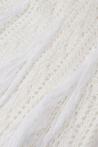 Robes jupe une étape sexy à col rond et pompon ajouré de couleur unie 