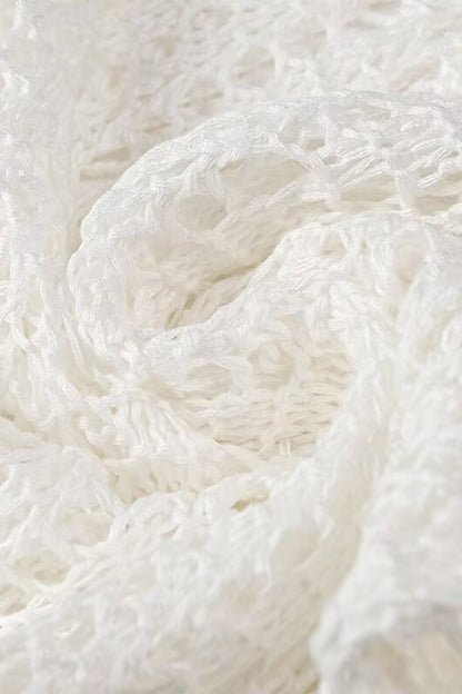 Robes jupe une étape sexy à col rond et pompon ajouré de couleur unie 